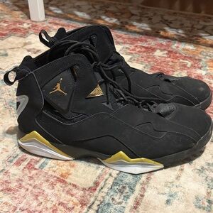 Black and Gold Air Jordan Sneakers